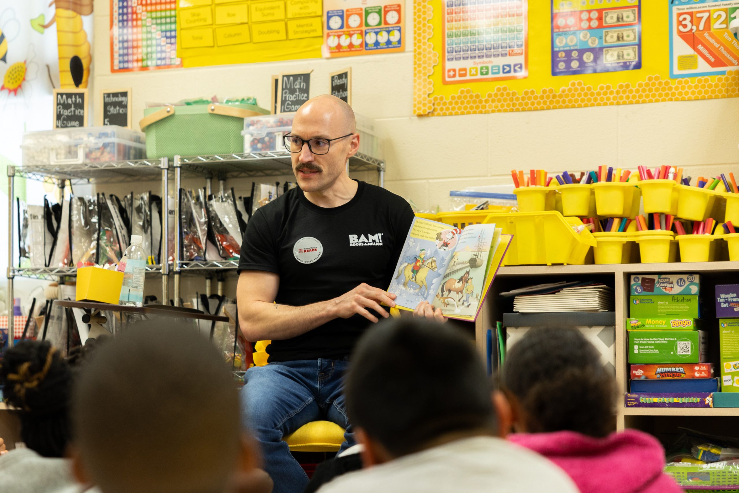Books-A-Million Joins Better Basics Reads, Donates $30,000 to Support Literacy for 14,000+ Birmingham-Area Students vp of hr at bam reading to classroom of children