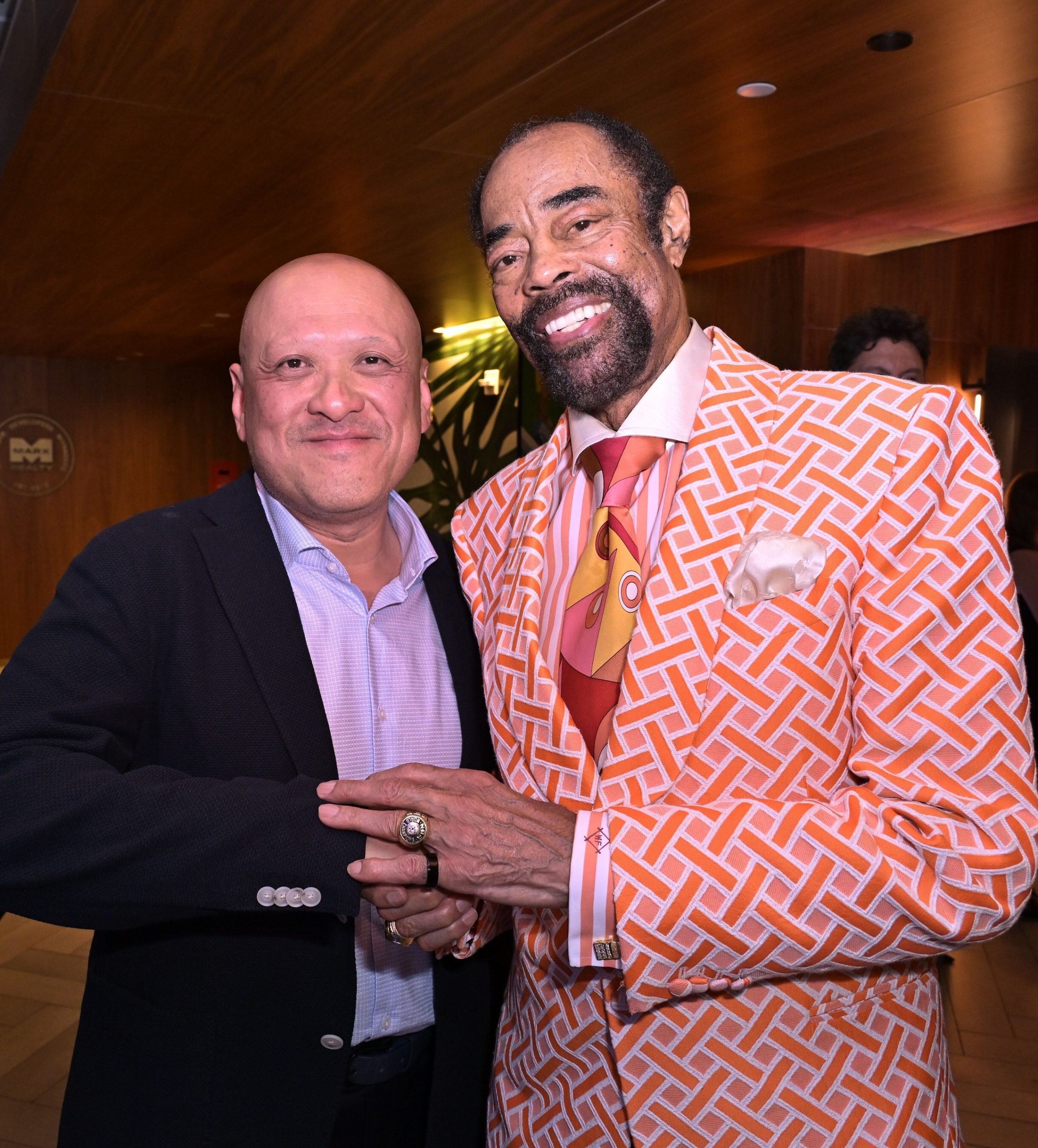 siegfried capital dr silver kung pictured with special guest walt clyde frazier