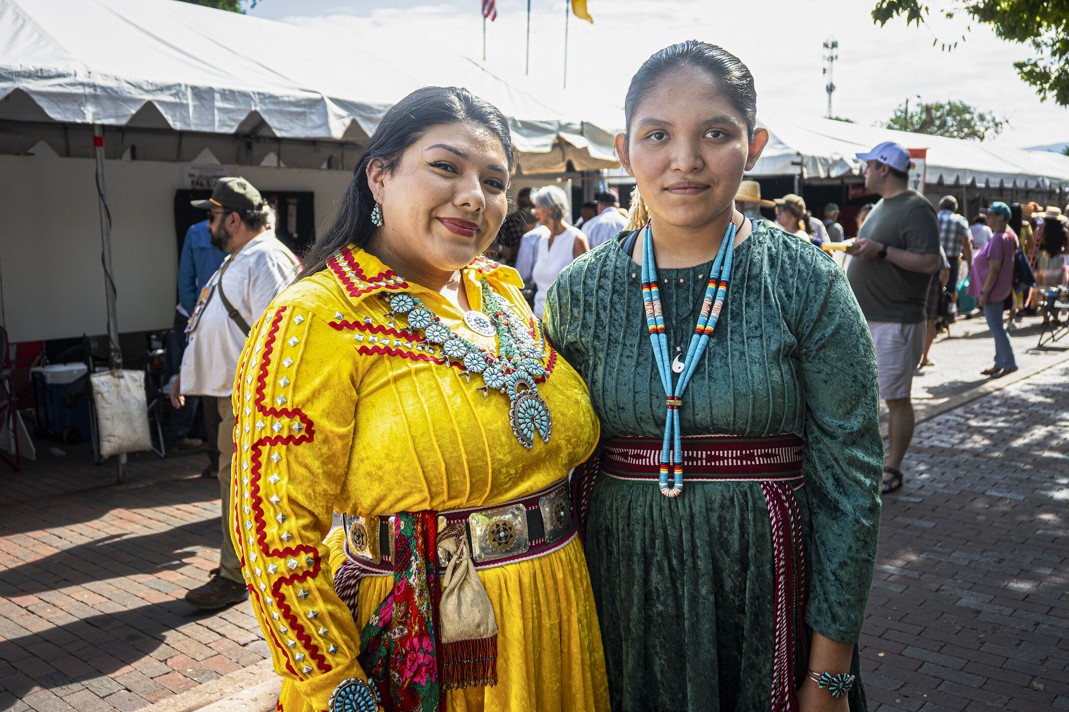 The 104th Annual Santa Fe Indian Market Announces Schedule of Events southwestern association for indian arts charon otero and kourtney toledo at the 2025 sfim
